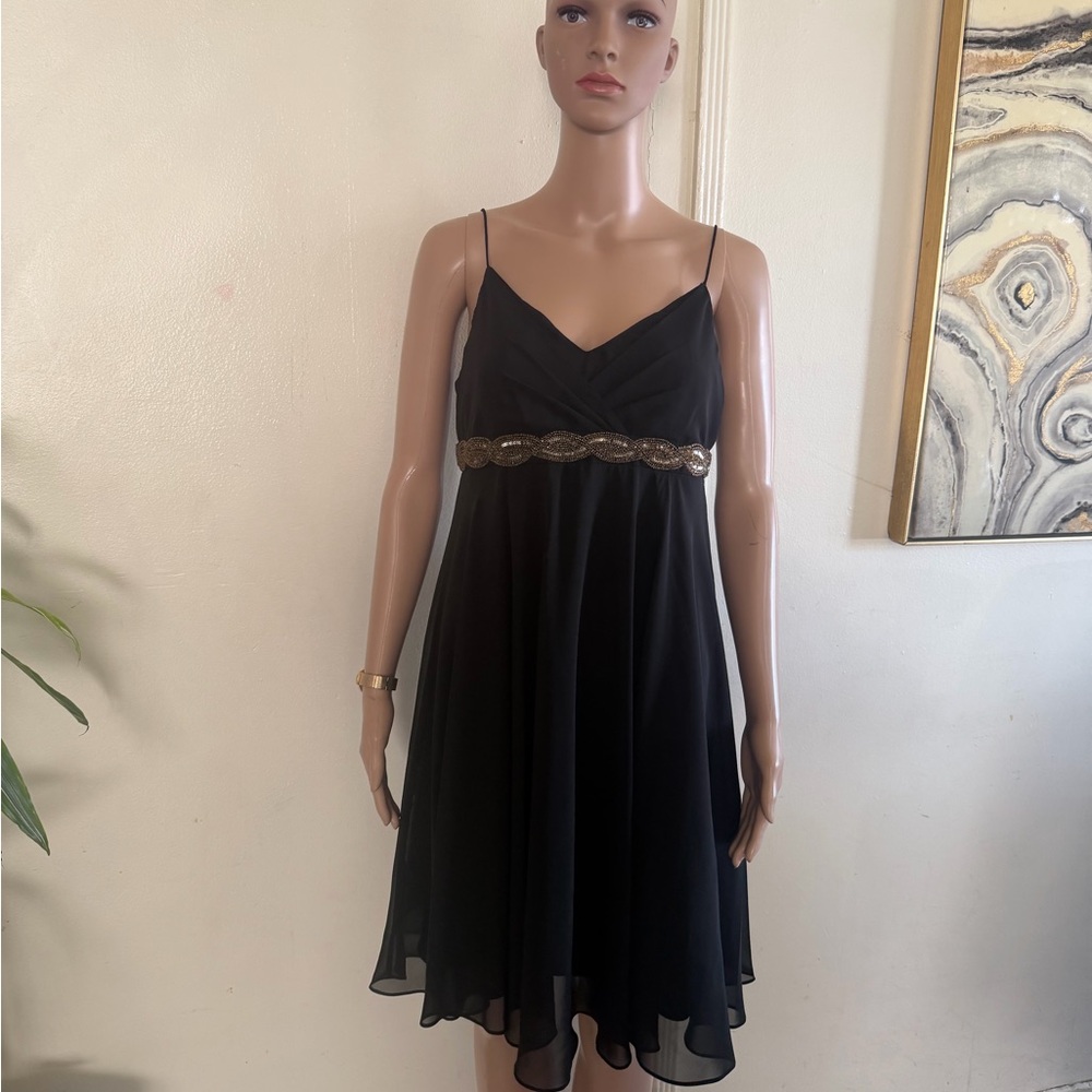 Chic Black Dress with Gold Detail